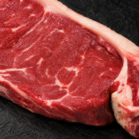 Detail van entrecote met natuurlijke vleesstructuur – Meat & Go